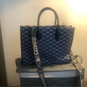 Barely used Michael Kors navy denim tote with crossbody strap